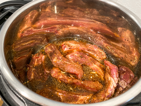 Asian Style Sticky Ribs getting dry rub